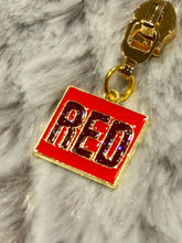 Load image into Gallery viewer, Red Album Zipper Pull (enamel glitter)
