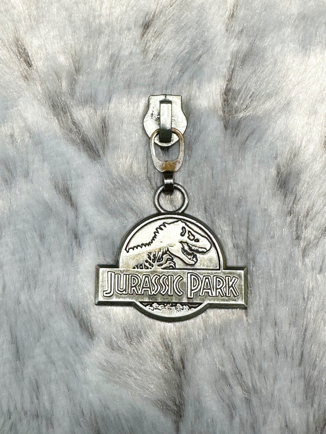 Jurassic Park Zipper Pull